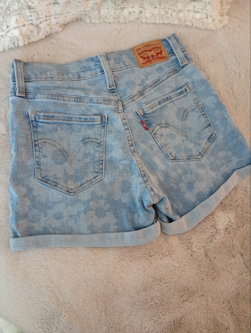 Levi's | Light Blue Floral Wash High-Rise Mid Length Denim Shorts | 25W
